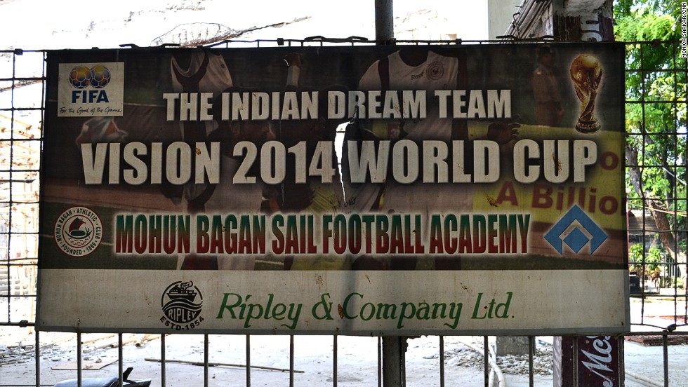 An old, torn poster hangs on a fence at the Mohun Bagan club grounds, dreaming of qualification of the national team in the 2014 FIFA World Cup. India has yet to qualify for the tournament, but hopes present developments will ensure its future presence.