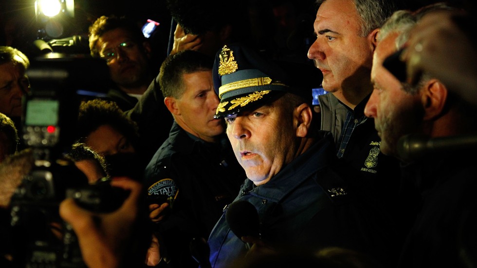 Boston Police Commissioner Edward Davis speaks during a media briefing in the parking lot of the Watertown Mall on Friday.