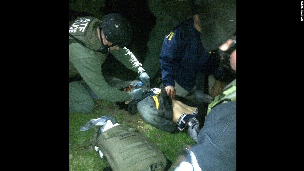An image posted to the social sharing website Reddit purportedly shows Dzhokhar Tsarnaev being detained by law enforcement officers.