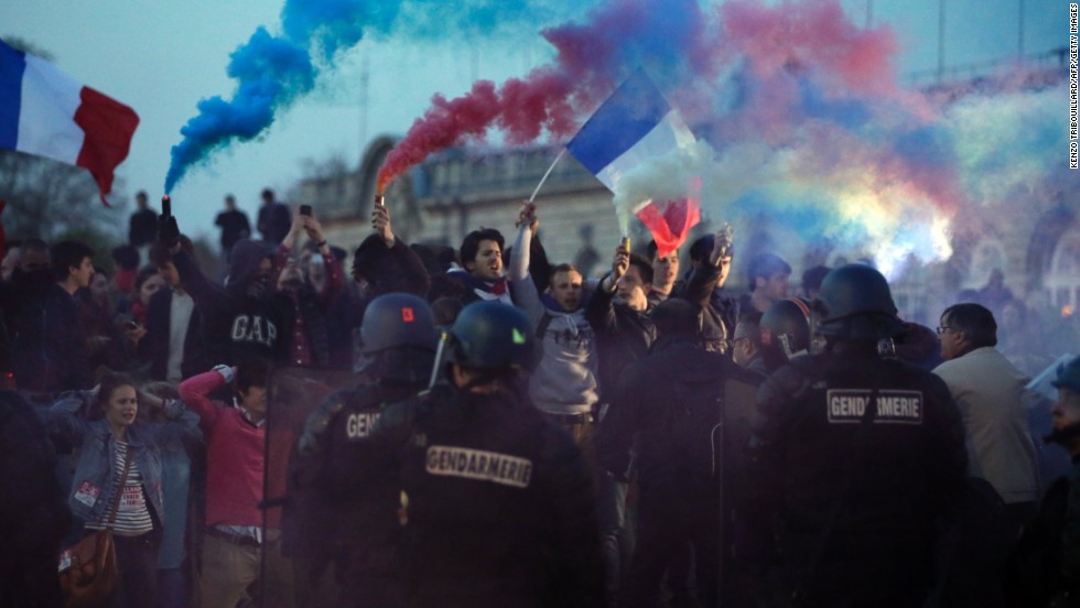 Opponents of a gay marriage bill face riot officers at &quot;La Manif Pour Tous,&quot; or demonstration for all, on Sunday, April 21. 
