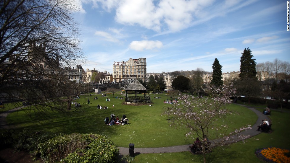 People take in the spring sunshine at Parade Gardens in Bath, England, on April 23.
