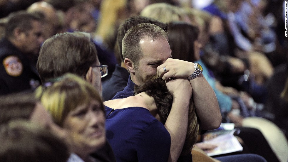 Mourners at the memorial on April 25.