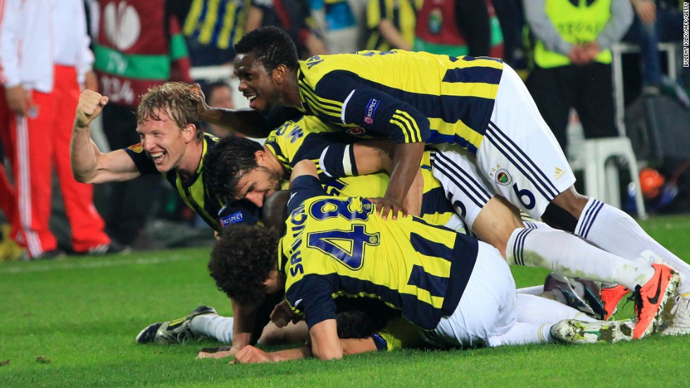 Fenerbahce players celebrate their winning goal in the Europa League semifinal first leg against Benfica. 