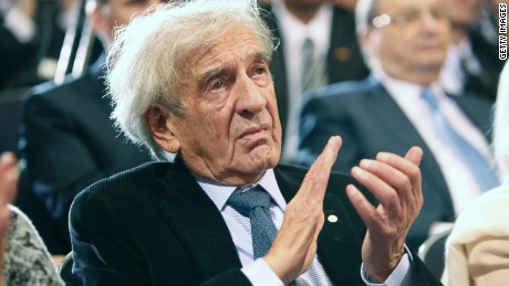 Elie Wiesel claps as U.S. President Barack Obama speaks at the Holocaust Museum April 23, 2012 in Washington, DC. 