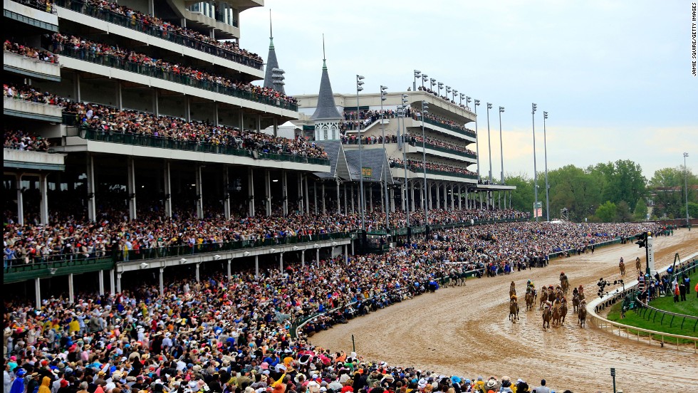 The horses enter the home stretch in front of more than 150,000 fans at Churchill Downs.