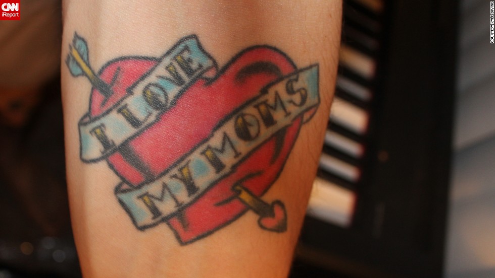 Kyle Divine &lt;a href=&quot;http://ireport.cnn.com/docs/DOC-967247&quot;&gt;honors both his moms&lt;/a&gt; with a tattoo he got on his arm on Mother&#39;s Day in 2006. &quot;My moms were the best role models I had while I was growing up, regardless of sexual orientation,&quot; he said. &quot;I got the tattoo to show them and the world that I am proud to have them as my parents.&quot; It also has a more subtle meaning: &quot;Without actually saying it, the tattoo says that I am a supporter of gay rights.&quot; Divine says both his moms love the ink.