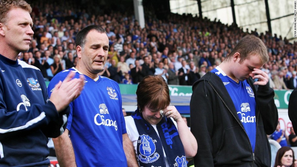 The family of murdered 11-year old boy Rhys Jones stand next to Moyes during a minute&#39;s appreciation before the start of the Premier League match between Everton and Blackburn Rovers at Goodison Park in August 2007. Rhys died after being shot in the neck as he played football with friends outside the Fir Tree pub in Croxteth, Liverpool in August. 