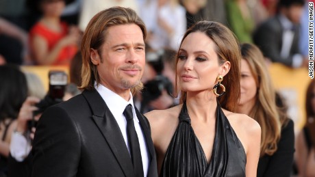 LOS ANGELES, CA - JANUARY 29:  (L-R) Actor Brad Pitt (L) and actress Angelina Jolie arrive at the 18th Annual Screen Actors Guild Awards at The Shrine Auditorium on January 29, 2012 in Los Angeles, California.  (Photo by Jason Merritt/Getty Images)