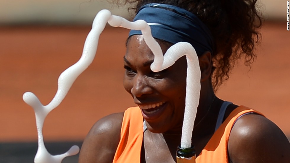 Serena Williams enjoys another champagne moment during her sparkling clay court season.