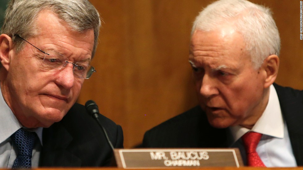 Sens. Max Baucus, left, and Orrin Hatch, co-chairmen of the Senate Finance Committee, confer in Washington in May 2013, during a hearing regarding the targeting of conservative groups.