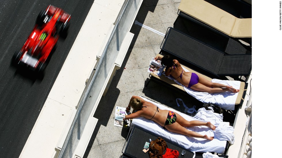 But for some sun-seekers in Monaco, the cars are a distraction...