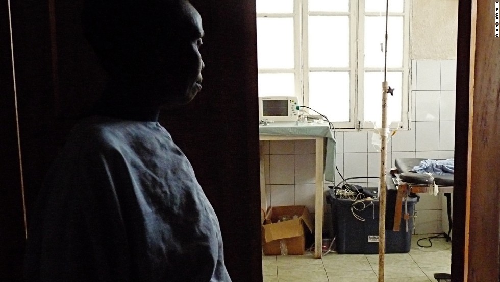 This woman, who has suffered from fistula for 20 years, watches as staff prepare for her surgery.