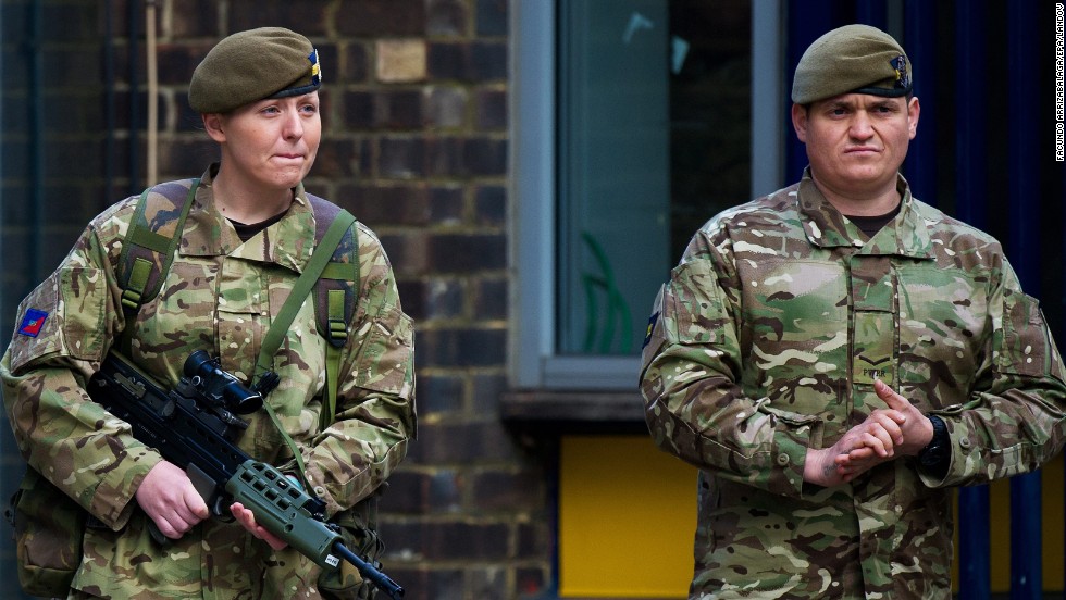 British soldiers stand guard outside the barracks on May 23.