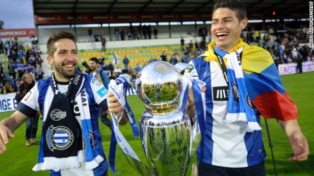 Joao Moutinho (left) and James Rodriguez hold the Portuguese league title after Porto&#39;s 2013 triumph.