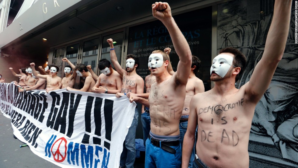 Opponents of the law  demonstrate in front of the headquarters of the Grand Orient de France, a Masonic order, in Paris on Friday, May 24. 