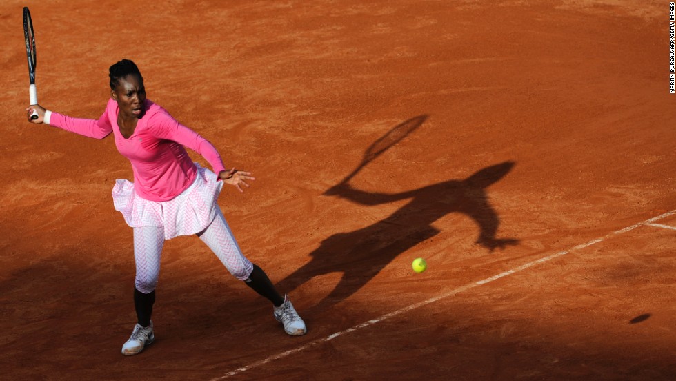 Venus Williams hits a return to Poland&#39;s Agnieszka Radwanska on May 26. Radwanska beat Williams 7-6(5), 6-7(4), 6-4.