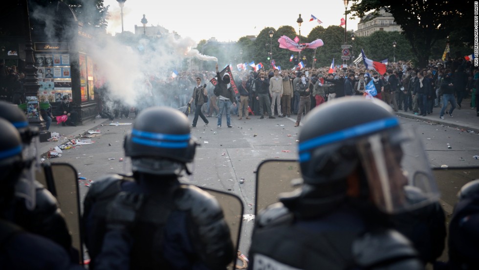 Riot policemen face off with protesters on May 26.
