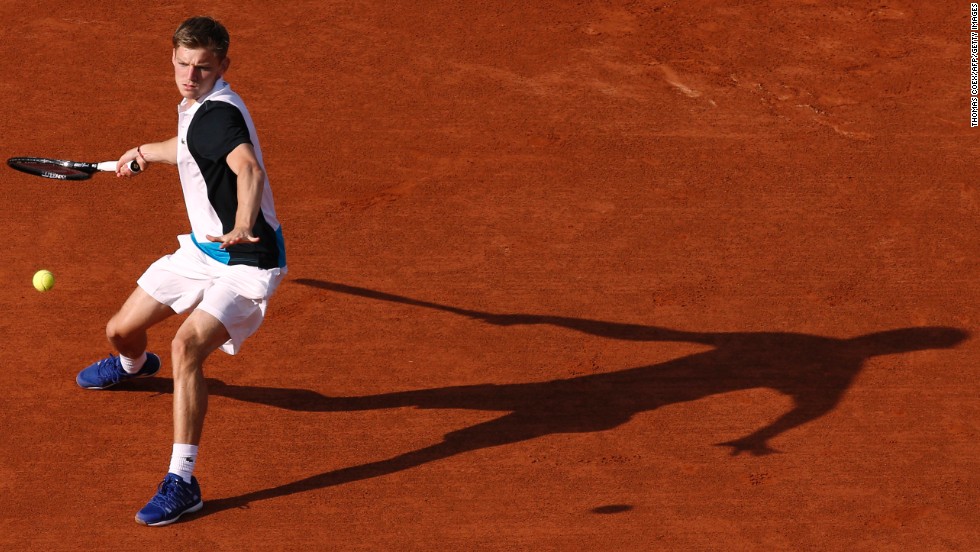 Belgium&#39;s David Goffin hits a forehand to Serbia&#39;s Novak Djokovic during a first round match of the French Open at Roland Garros Stadium in Paris on Tuesday, May 28.