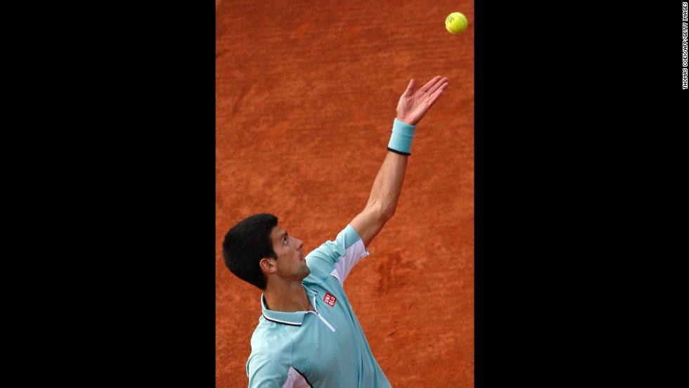 Djokovic serves to Goffin during their first round match on May 28.