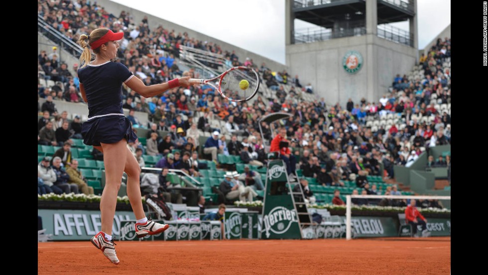 France&#39;s Alize Cornet returns to Portugal&#39;s Maria Joao Koehler during their first round match on May 28.