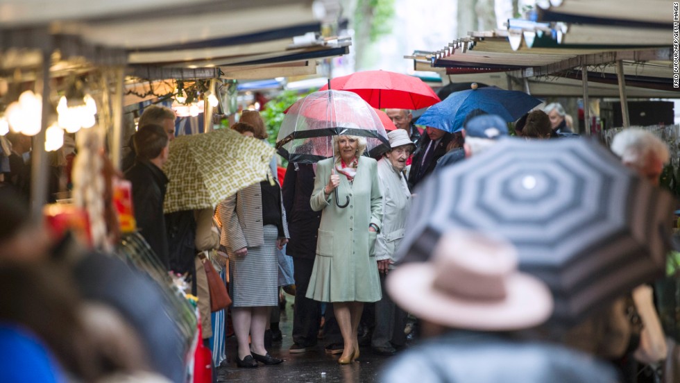 Camilla strolls through the Parisian market. At another stall, she bought five dresses for her grand-daughters from a trader who described the duchess as polite and said she &quot;loved everything.&quot; 