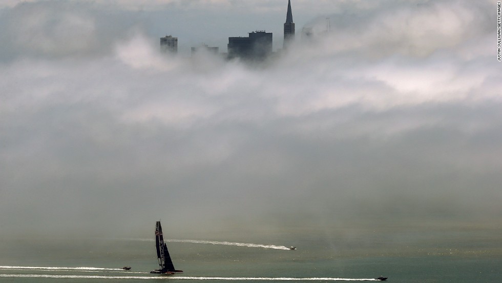Heavy fog fills San Francisco Bay as seen from Sausalito, California, as the city&#39;s skyline struggles to peak through on May 28.