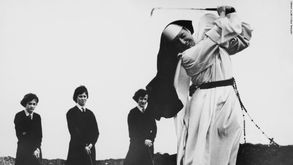 Nun and golf coach, Sister Mary Martina was a regular on the course. Here she shows students how to take an iron shot while on the golf course at Rosebud Country Club, Portsea, Victoria, Australia back in in 1965.