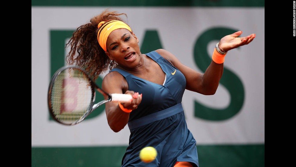 Serena Williams of the United States plays a forehand against Sorana Cirstea of Romania on May 31. Williams won 6-0, 6-2.