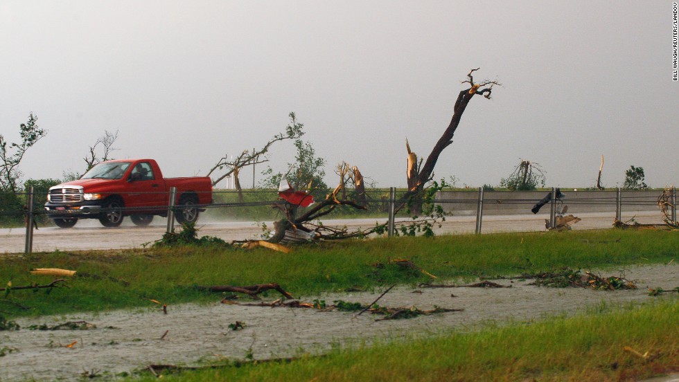 Shredded trees and debris are scattered along Interstate 40 near El Reno, Oklahoma, on May 31. 