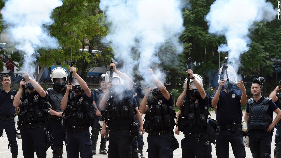 Riot police fire tear gas during a protest against Turkey&#39;s Prime Minister Recep Tayyip Erdogan and his ruling AK Party in central Ankara on June 2. Sparked by the events in Istanbul, general anti-government protests have sprung up in Ankara.