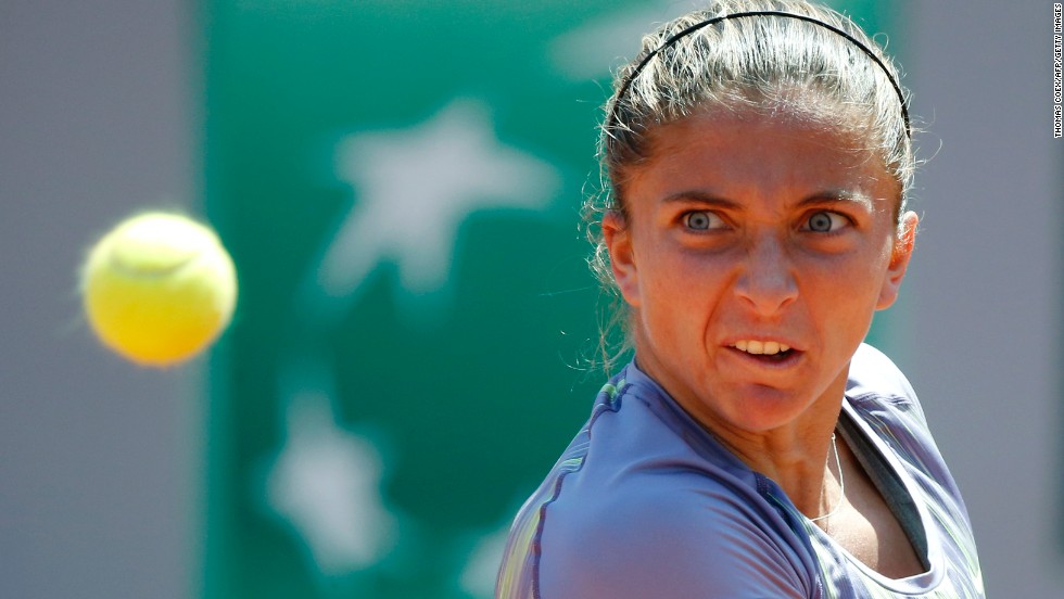 Sara Errani of Italy hits a return to Agnieszka Radwanska of Poland during a quarter final match on June 4. Errani defeated Agnieszka 6-4, 7-6 (6).