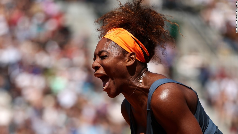 Serena Williams of the U.S. celebrates a point during her win over Svetlana Kuznetsova of Russia during the women&#39;s singles quarter-final match June 4. Williams defeated Kuznetsova 6-1, 3-6, 6-3.