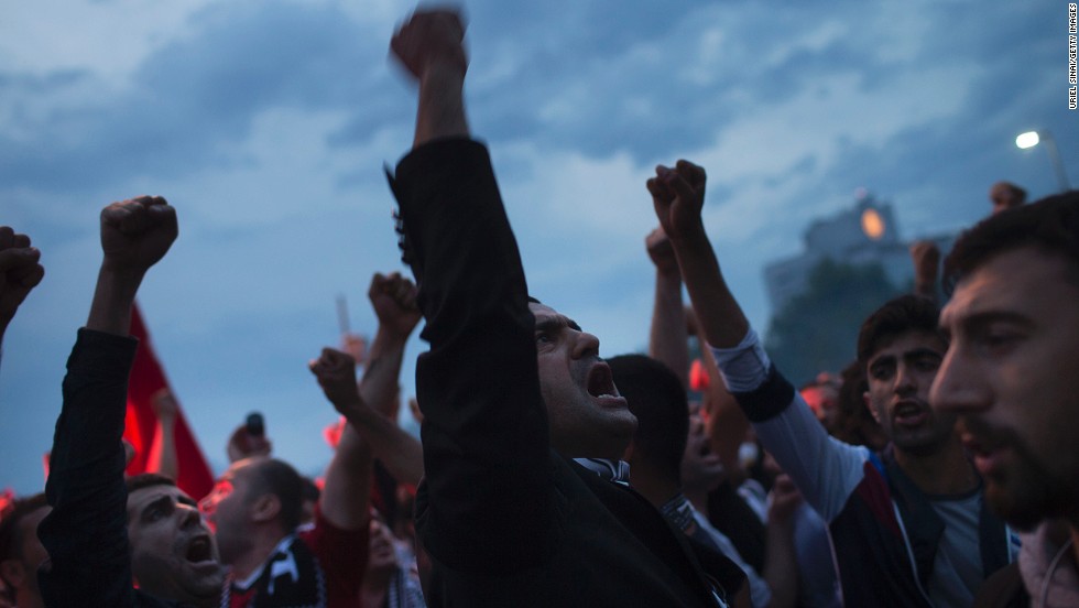 Protesters gather in Taksim Square as they shout slogans while protesting on Tuesday, June 4, in Istanbul, Turkey.