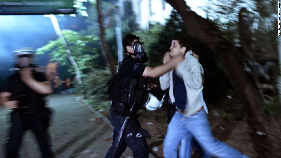 Turkish police detain a demonstrator during clashes in Istanbul on June 4.