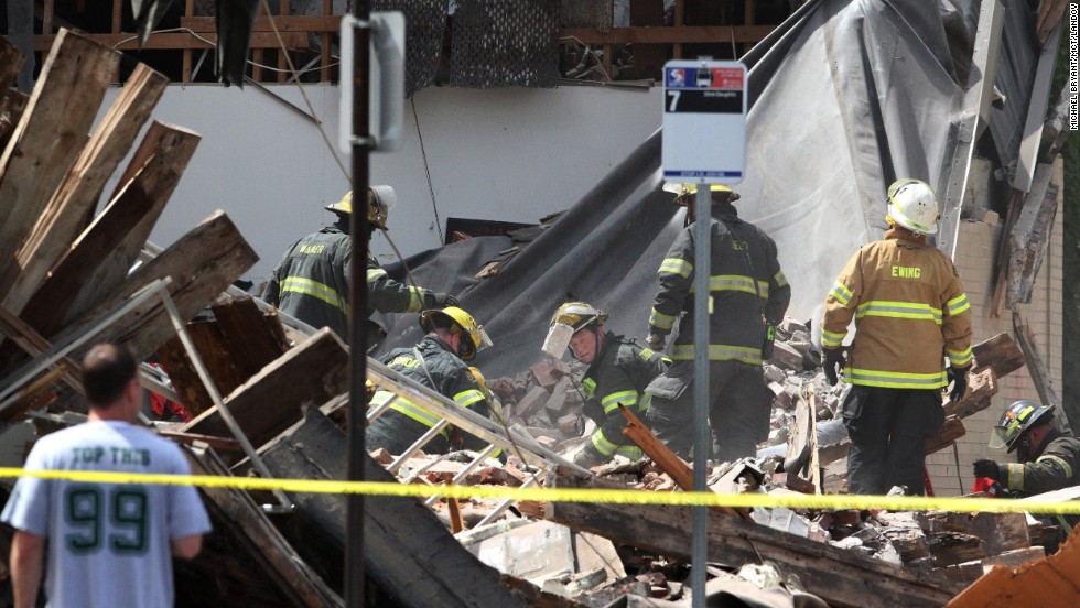 Crane operator wanted in Philadelphia building collapse turns self in - CNN