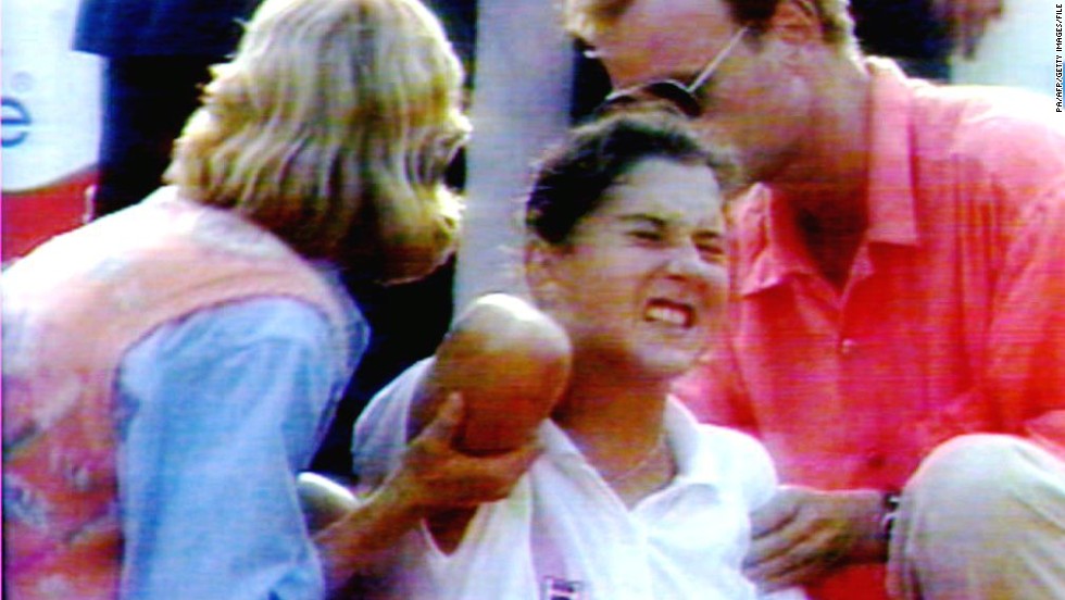 Seles defended all three of her grand slam titles in 1992, and lost in the final at Wimbledon. She then won the  Australian Open for the third time in a row, but the defining moment of her career arrived at the 1993 Hamburg Masters, when a man later identified as an obsessive fan of Graf ran onto the court and stabbed her in the back. Her injuries healed within weeks, but Seles was out of the sport for over two years.
