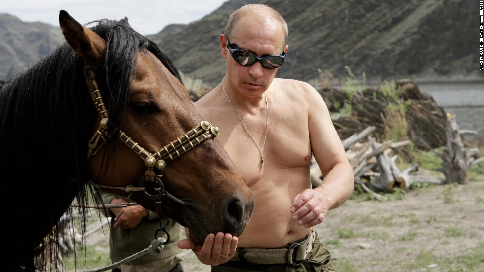 Putin vacations outside the town of Kyzyl in Southern Siberia in 2009. Over the years he has earned &lt;a href=&quot;http://www.cnn.com/2012/03/02/europe/gallery/cult-of-vladimir-putin/index.html&quot;&gt;a reputation as a &quot;strongman,&quot;&lt;/a&gt; declaring a crackdown on Chechen militants a priority in his first presidential term. 