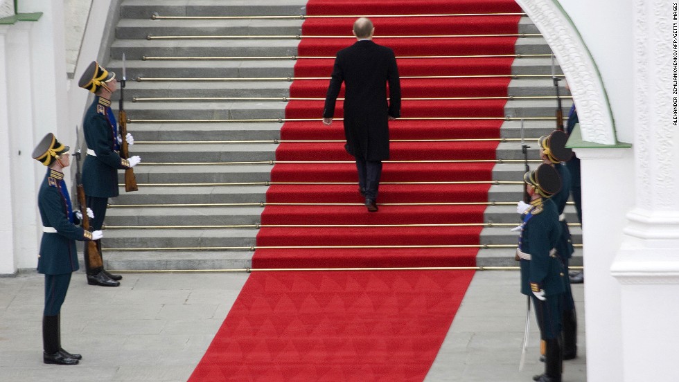 Putin attends an inauguration ceremony for President-elect Dmitry Medvedev in May 2008. Putin was constitutionally obliged to stand down as President, but he stayed close to power, becoming Prime Minister.