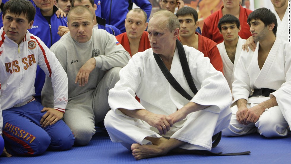 Russian president Vladimir Putin has championed sport, partly as a way of demonstrating the nation&#39;s prestige. A keen sportsman, Putin is pictured taking part in a judo training session at a sports complex in St. Petersburg in December 2010. The Russian leader holds a black belt in judo.