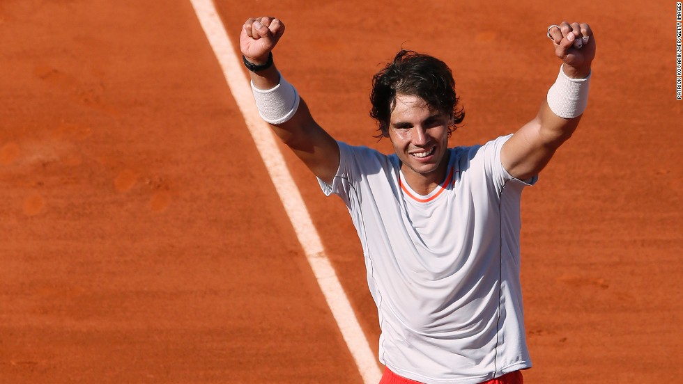 Spain&#39;s Rafael Nadal celebrates after defeating Serbia&#39;s Novak Djokovic during a French Open semifinal match in Paris on June 7. Nadal won 6-4, 3-6, 6-1, 6-7(3), 9-7.