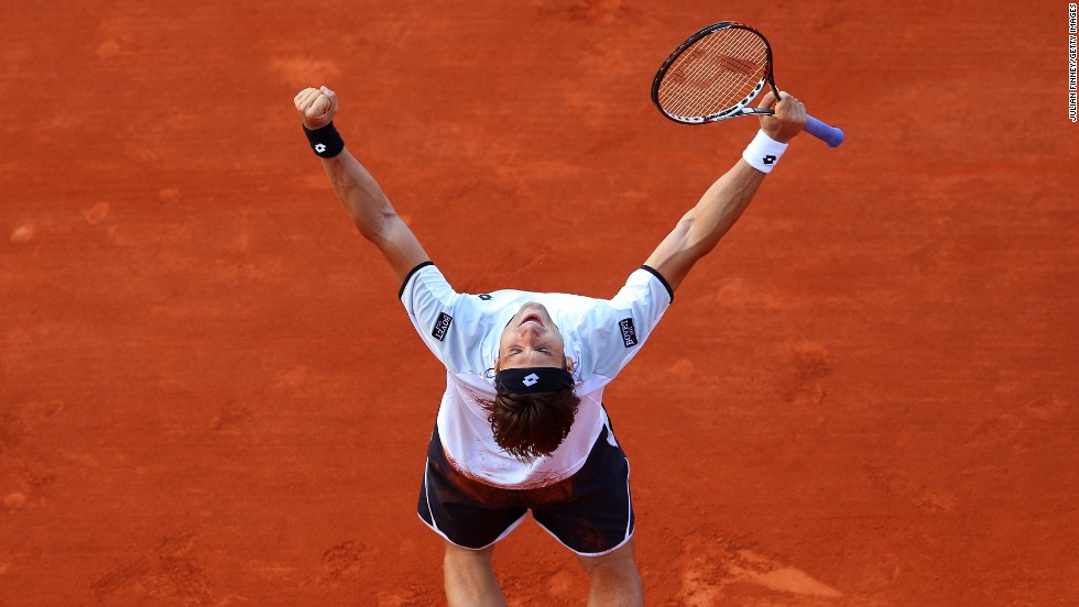 David Ferrer of Spain celebrates after defeating Jo-Wilfried Tsonga of France at the French Open at Roland Garros on Friday, June 7.  Ferrer won 6-1, 7-6(3), 6-2 . Click through to see more tennis action.