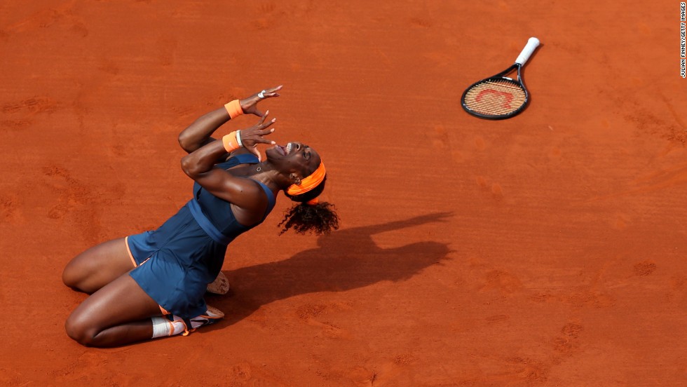 Serena Williams of the United States celebrates match point against Maria Sharapova of Russia during their women&#39;s singles final match of the French Open at Roland Garros in Paris on Saturday, June 8. Williams won 6-4, 6-4.