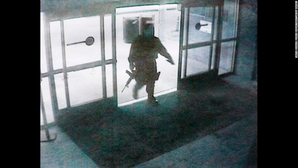 This photo, released by the Santa Monica Police department, shows the gunman entering the Santa Monica College library on June 7.  The gunman&#39;s shooting spree began in a home near the college, where two were found dead, and ended when police killed him in the college library. Santa Monica police have identified the suspect as John Zawahri. 