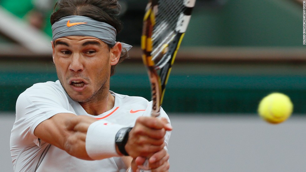 Nadal returns to Ferrer.