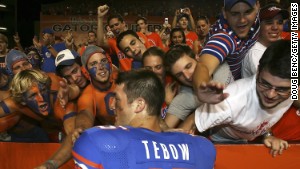 Tim Tebow rushes to help during in-flight medical emergency