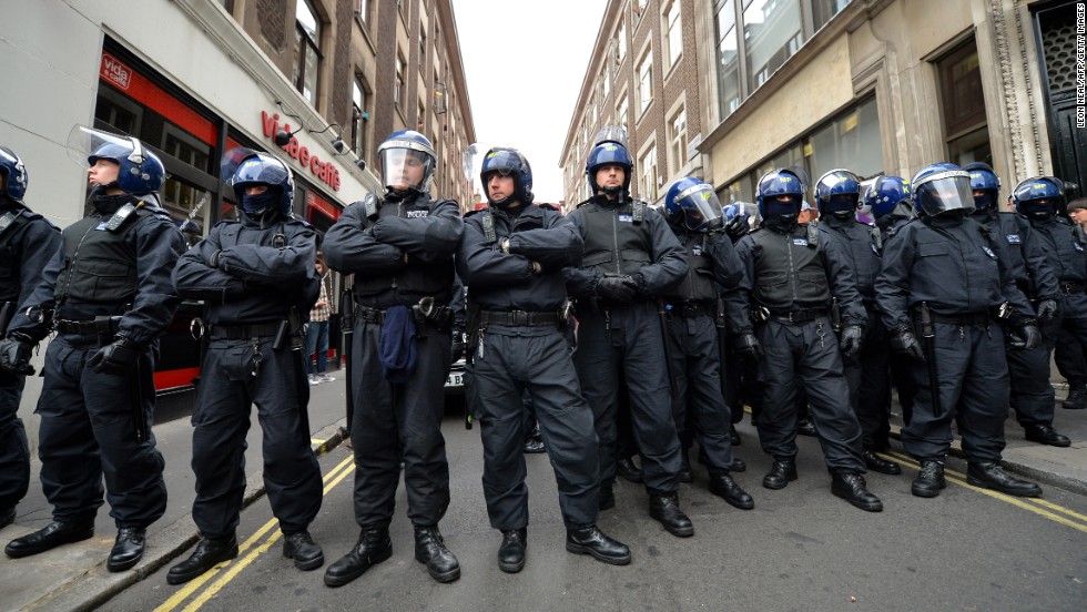 Police stand guard in central London on June 11.