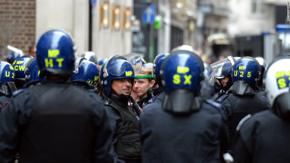 Officers move through central London on June 11.