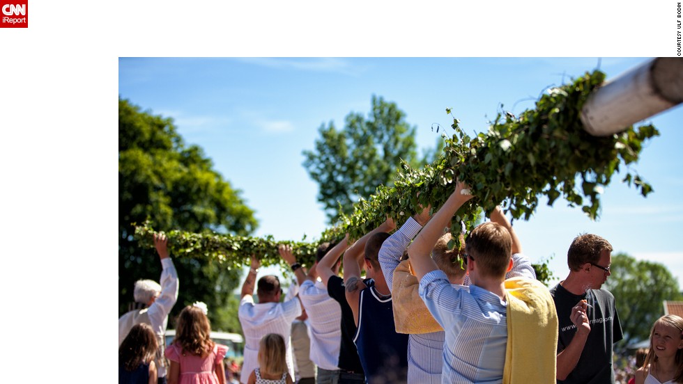 In Sweden, where Midsummer is one of the biggest celebrations of the year, singing and dancing are central to the fun and frolics. But before all that the maypole has to be decorated and raised. &lt;a href=&quot;http://ireport.cnn.com/people/ulfbodin&quot; target=&quot;_blank&quot;&gt;Ulf Bodin&lt;/a&gt; took this photo in the small town of Sigtuna, an hour north of Stockholm. 