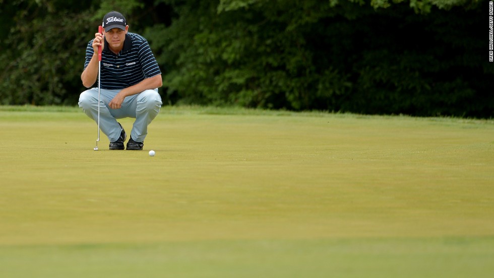 Bill Haas of the United States ponders a putt on the 10th hole on June 13.