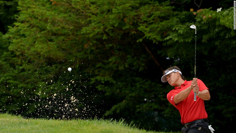 Ryan Yip of Canada hits his second shot out of a bunker on the 10th hole on June 13.